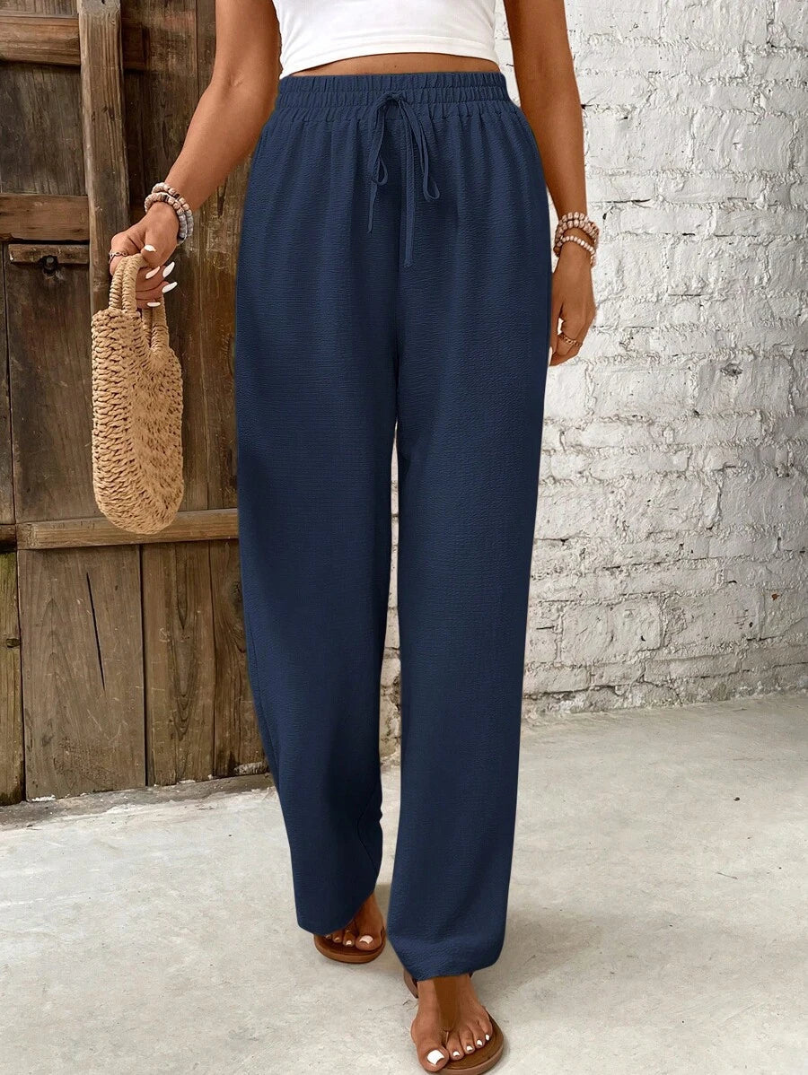 Skylar white high-waist relaxed lounge pants with chic button accents for women