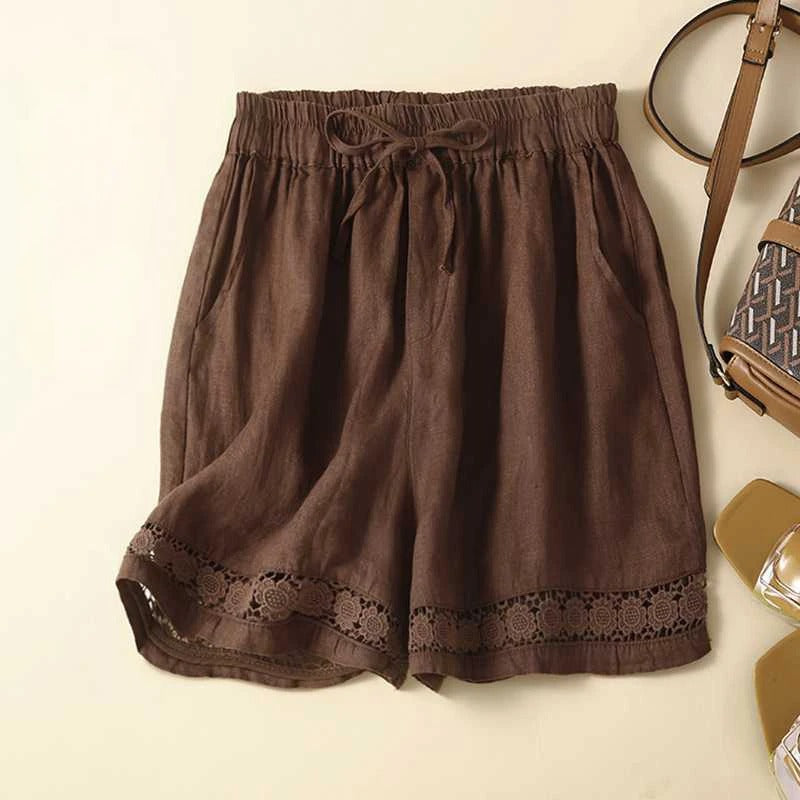 Relaxed floral shorts with soft waistband, roomy fit, and subtle embroidered trim for effortless feminine style