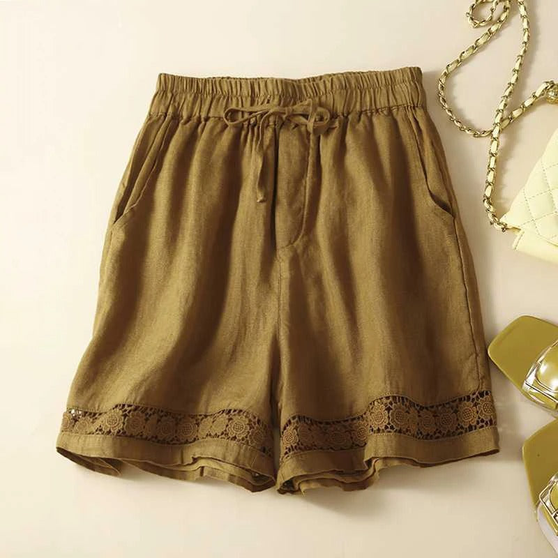 Relaxed floral shorts with embroidered trim, soft elastic waist, roomy feminine fit for warm days