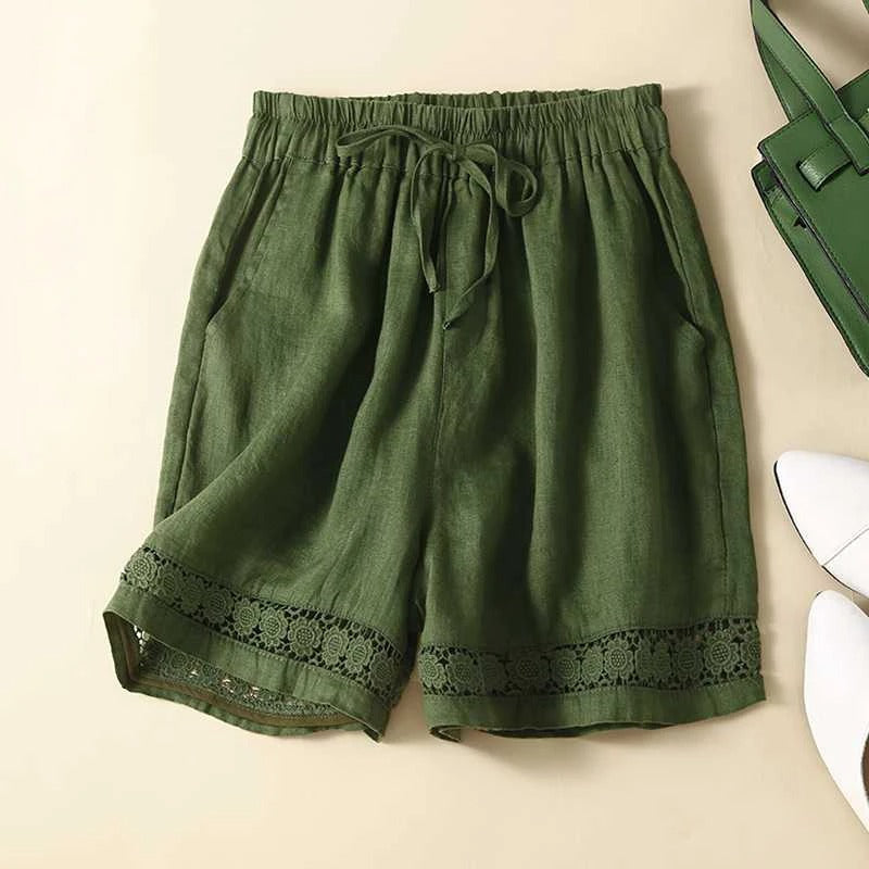 Relaxed floral shorts with soft waistband, roomy fit, and subtle embroidered trim for women
