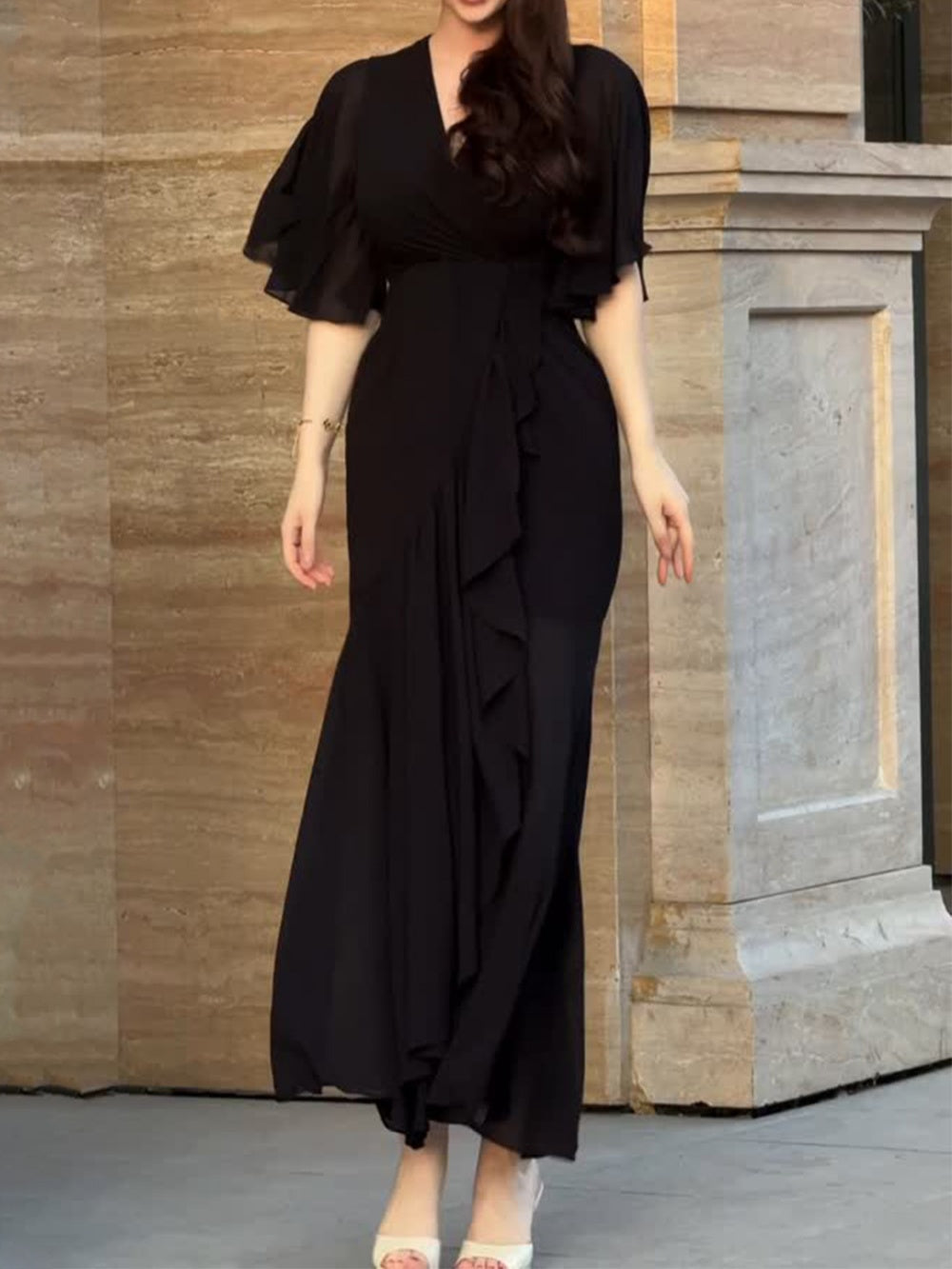 Retro V-neck midi dress with trumpet sleeves and vintage-inspired floral print, elegant feminine silhouette