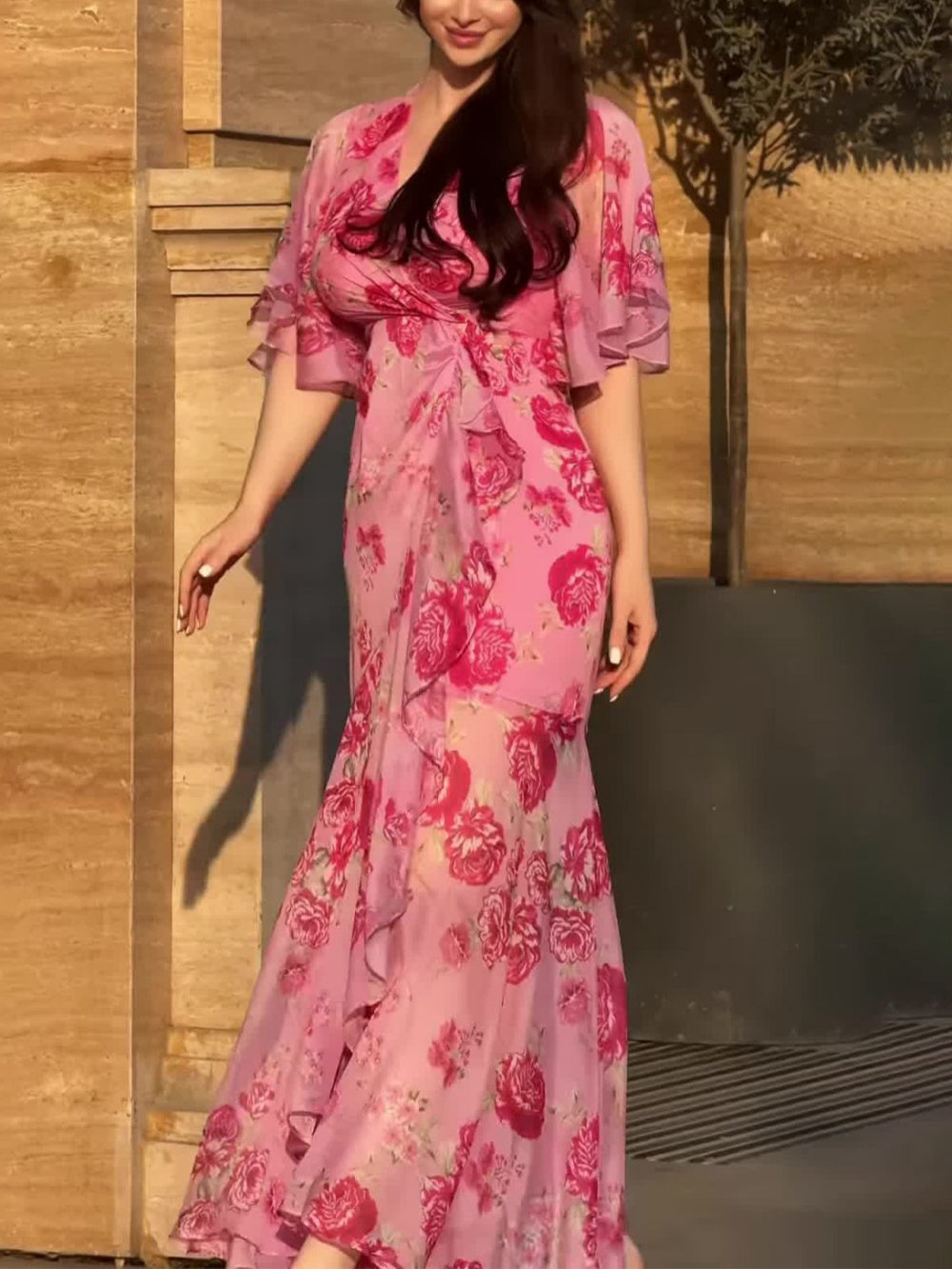 Retro V-neck midi dress with trumpet sleeves and vintage-inspired printed design for effortless elegance