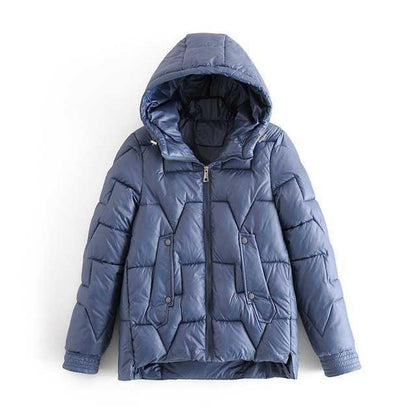 Women's slim-fit black puffer coat with quilted panels, cozy warmth, and modern everyday silhouette