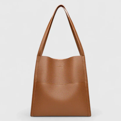 Structured handbag clean lines spacious interior minimalist design neutral tone everyday work tote