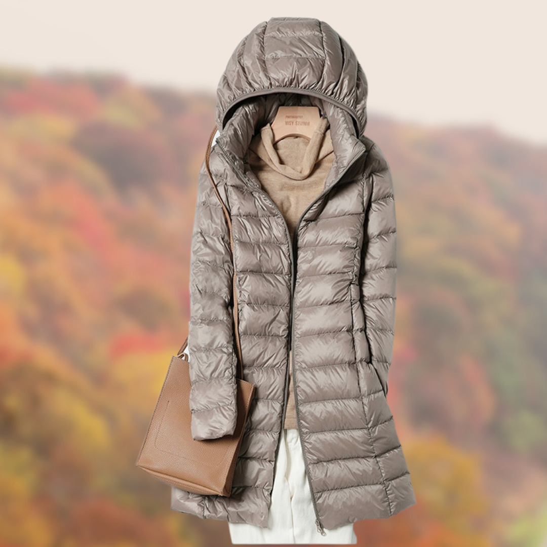 Women's slim fit hooded puffer jacket in neutral tone, lightweight warmth with streamlined silhouette