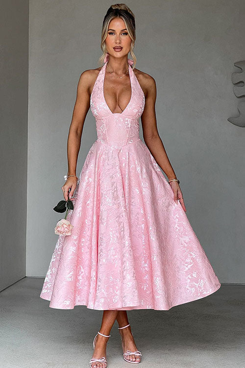 Floral jacquard maxi dress with V-neck halterneck, cinched waist, and flared skirt for celebrations