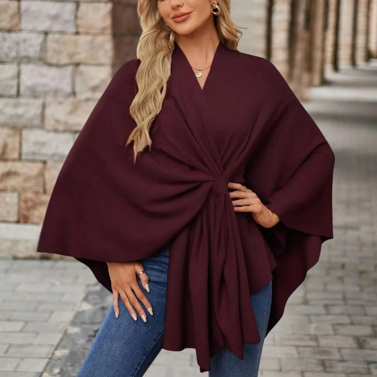 Elegant draped poncho with chic front knot design in soft flowing silhouette for women