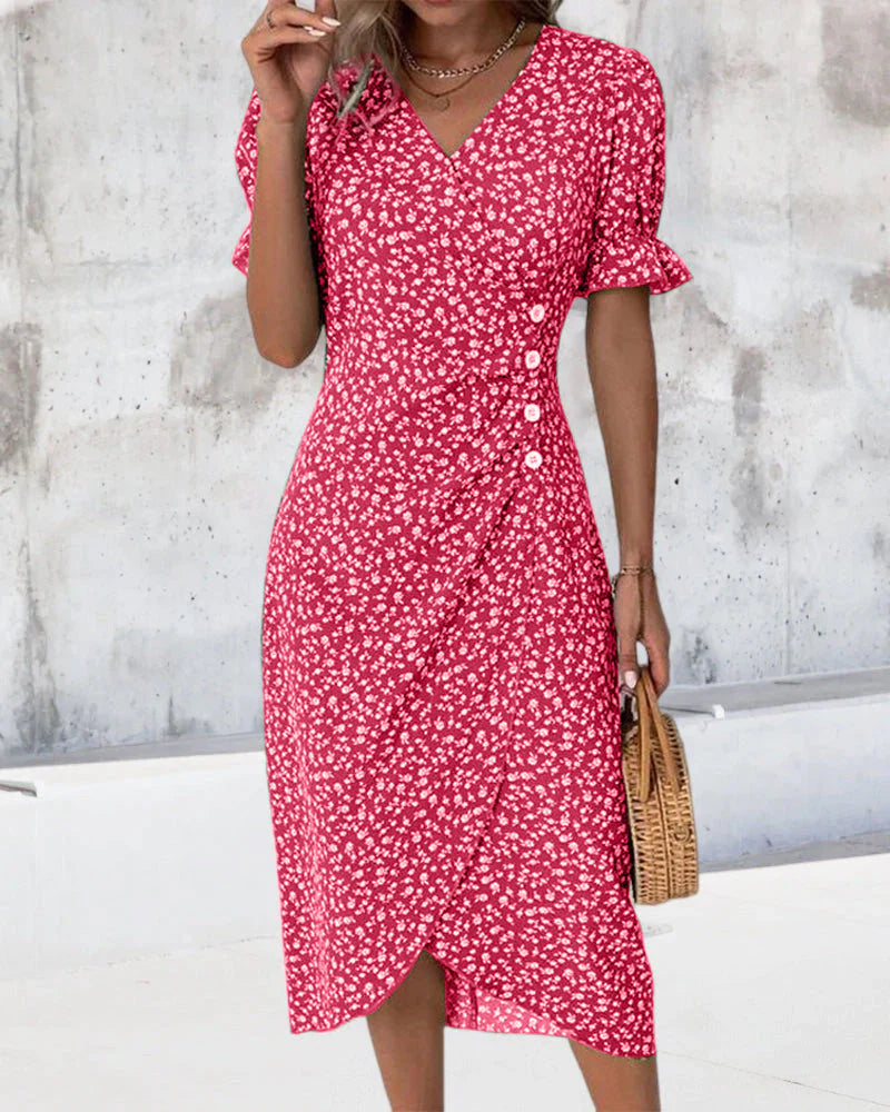 Blue floral wrap midi dress with V-neckline and adjustable waist-defining silhouette