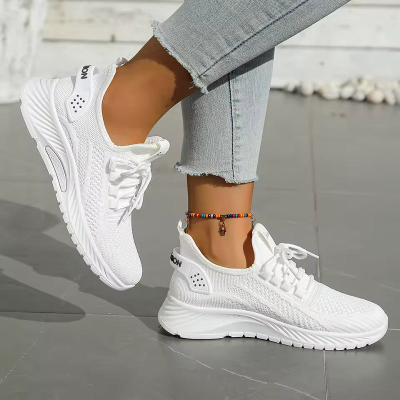 White Milani comfort lace-up sneakers with breathable mesh upper and cushioned sole