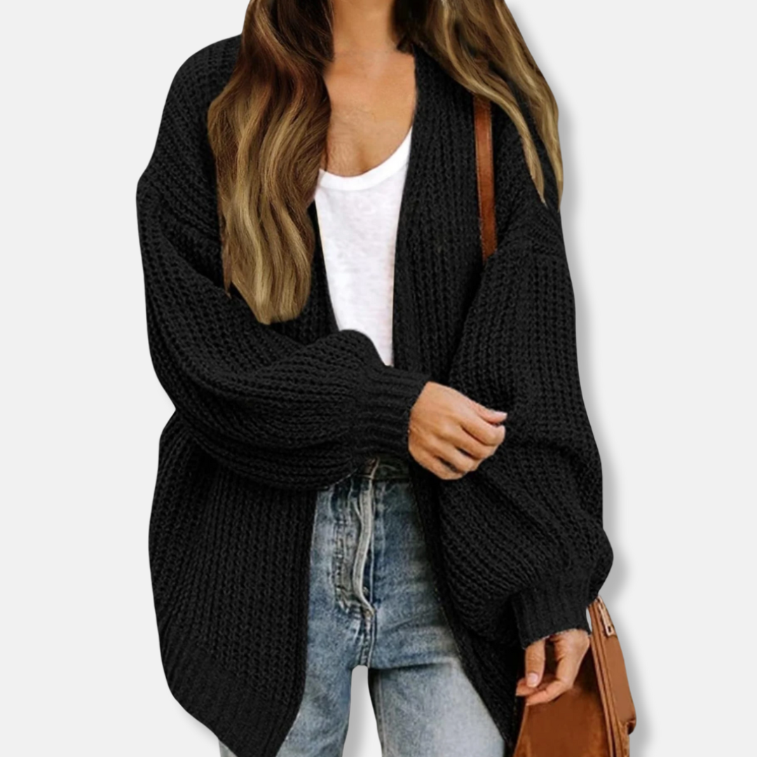 Women's oversized knit cardigan with lantern sleeves and ribbed cuffs for refined layering
