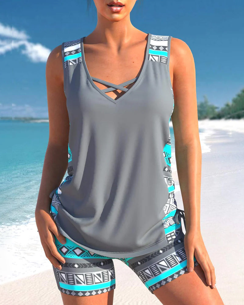 Women's white tankini two-piece swimsuit with tummy-smoothing coverage and modern flattering cut