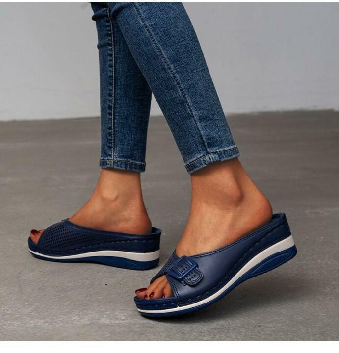 Women's comfort flat sandals in neutral tone with cushioned soft footbed and supportive elegant silhouette