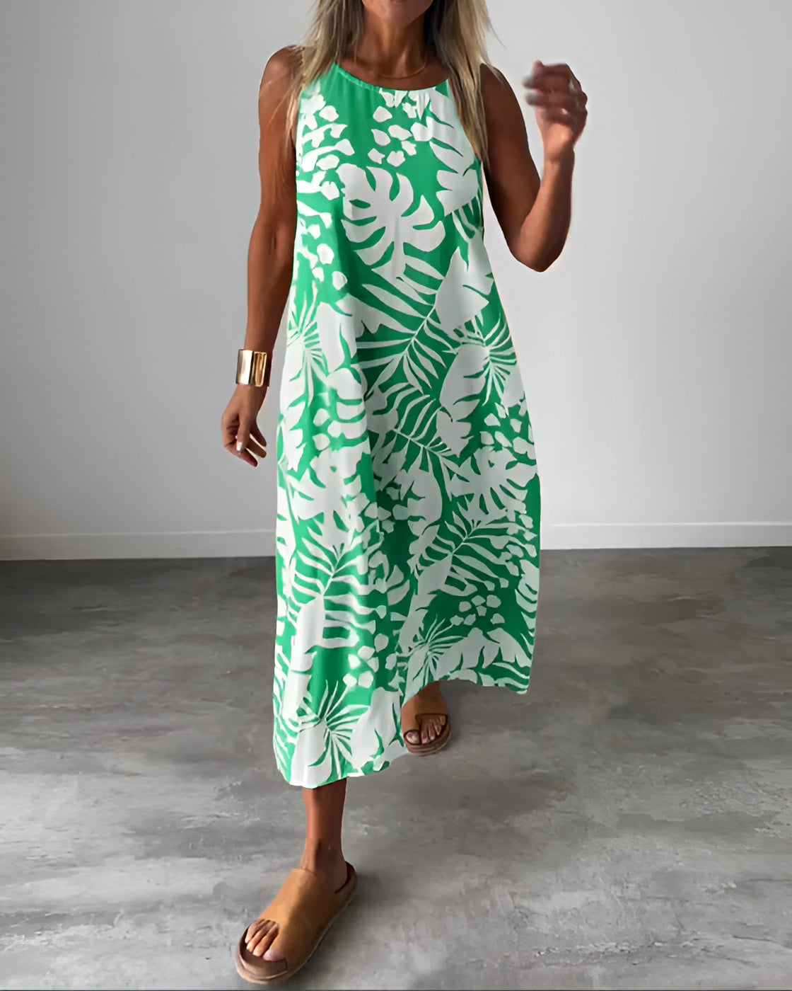 Women's sleeveless draped elegant evening dress with waist-defining silhouette and flowing feminine cut