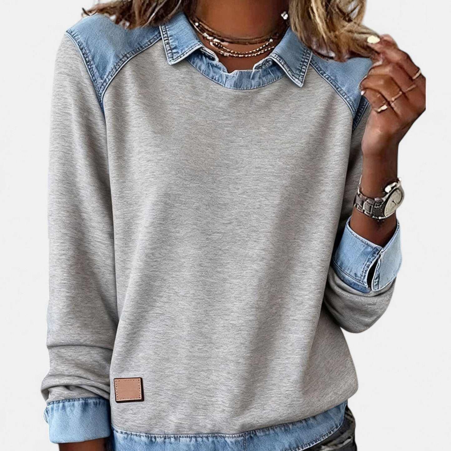 Women's long sleeve sweater in trendy minimalist cut with clean lines and soft flattering fit
