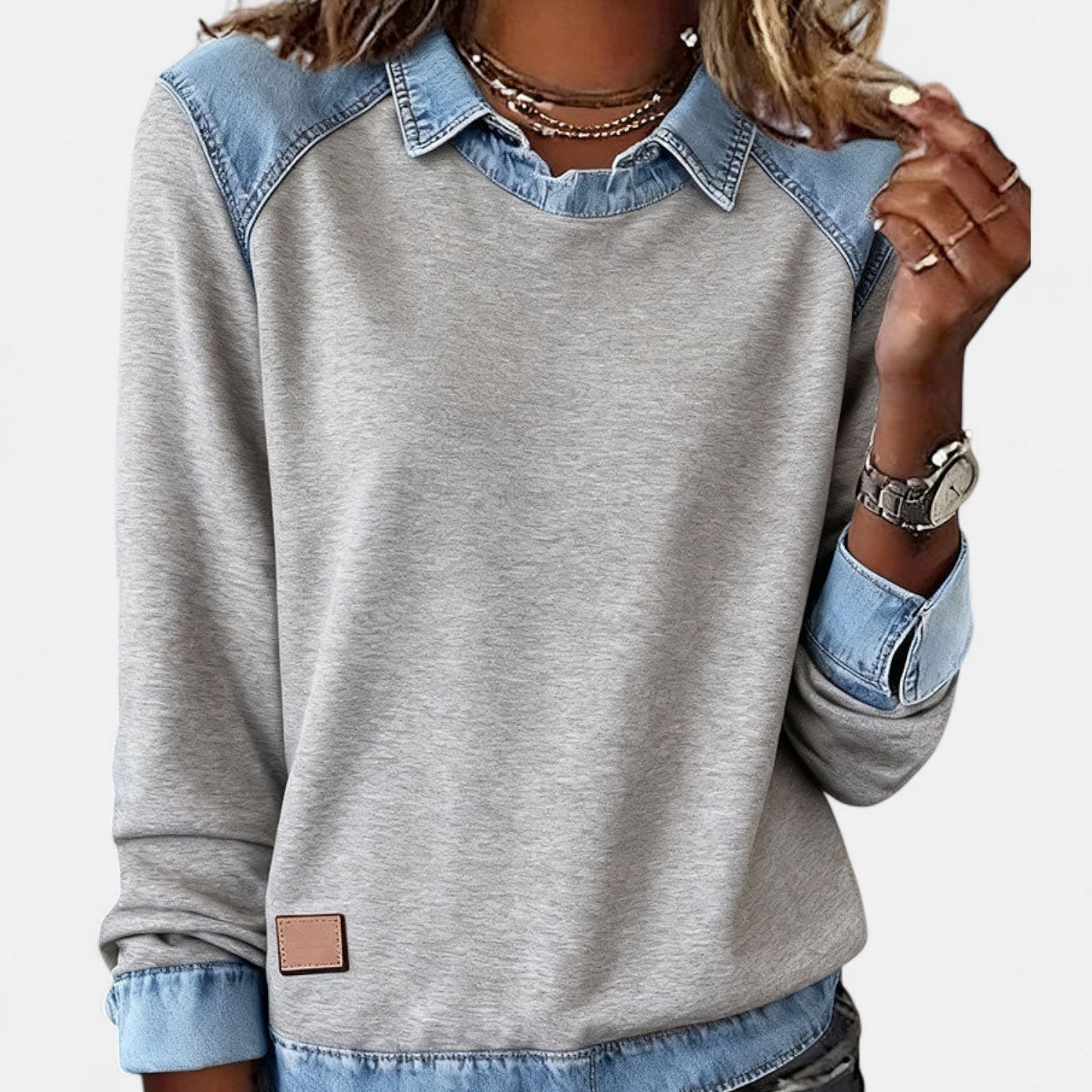 Women's long sleeve sweater in trendy minimalist cut with clean lines and soft flattering fit
