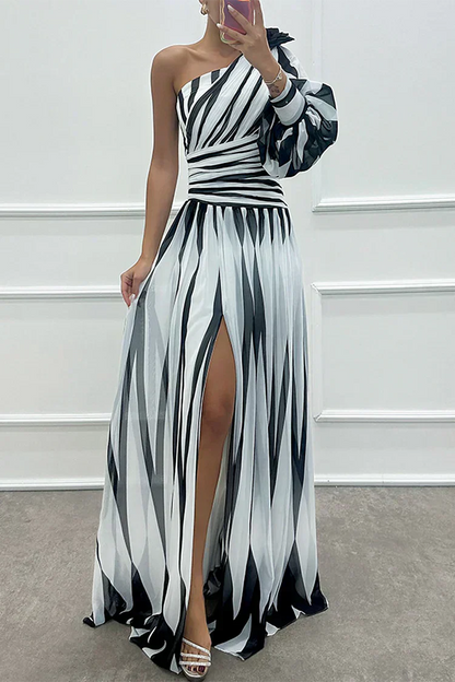 Striped one-shoulder asymmetric maxi dress in elegant flowing silhouette for wedding guests