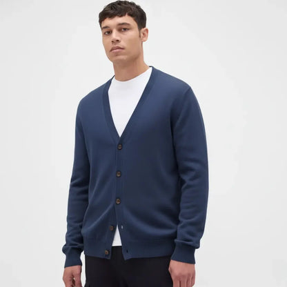 Ivory classic cashmere cardigan with V-neckline, button-up closure, and ribbed cuffs for luxe layering
