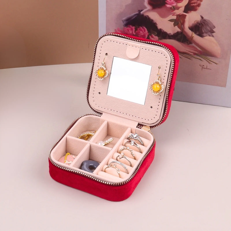Rivelle velvet-lined jewelry box, compact travel-friendly case with secure zipper closure