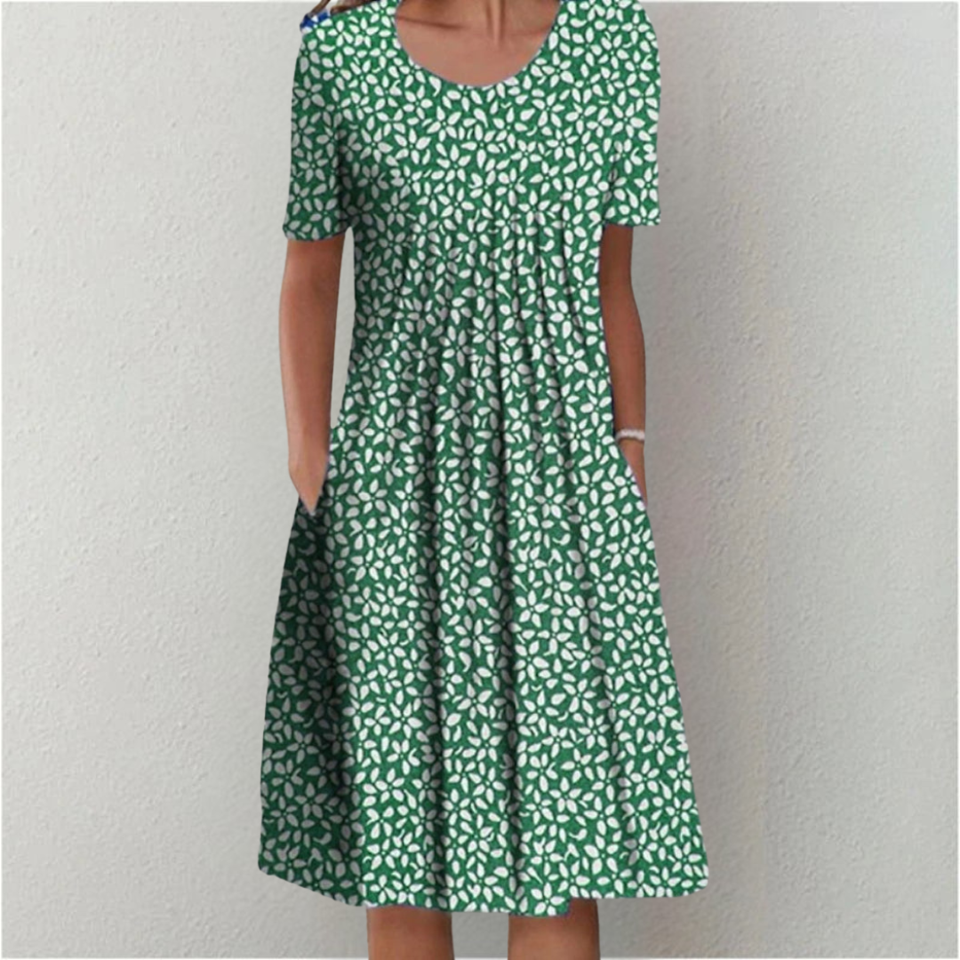 Casual floral dress with flattering silhouette and functional side pockets for effortless feminine style