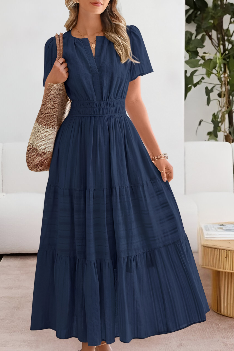 Boho flowy summer dress in light tones, breezy loose silhouette with relaxed fit for effortless warm-weather style