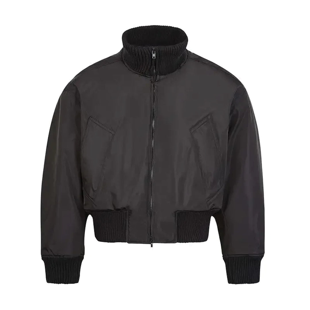 Cropped bomber jacket in neutral tone with ribbed collar, cuffs, and hem for a clean minimal look