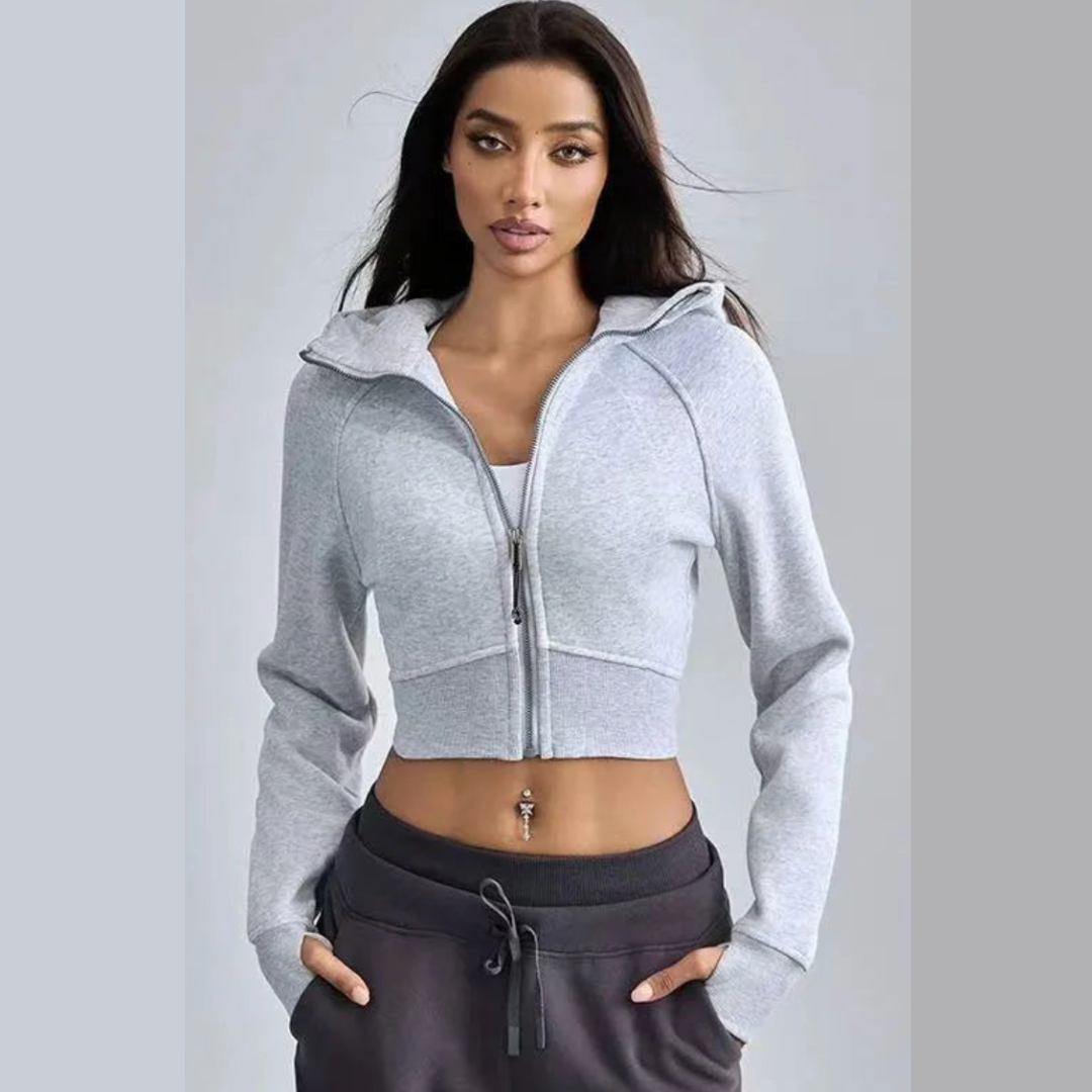 ZenCore cropped zip-up hoodie in neutral tone, sculpted body-hugging fit with high-neck closure