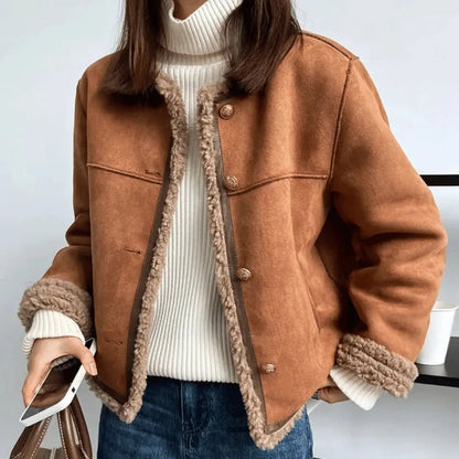 Women's beige sherpa jacket with suede detailing, plush lining, elegant cozy winter outerwear