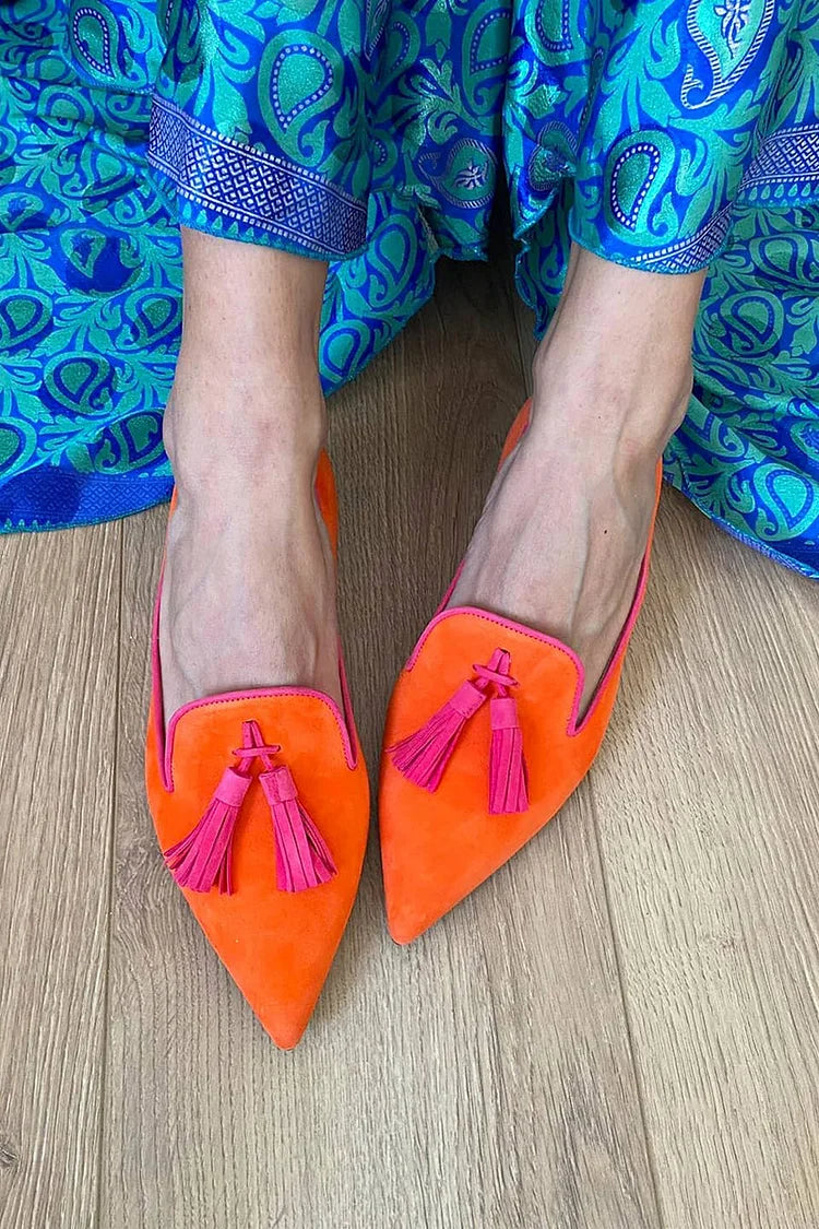 Polished tassel loafers in smooth finish with classic elegant detailing and versatile silhouette