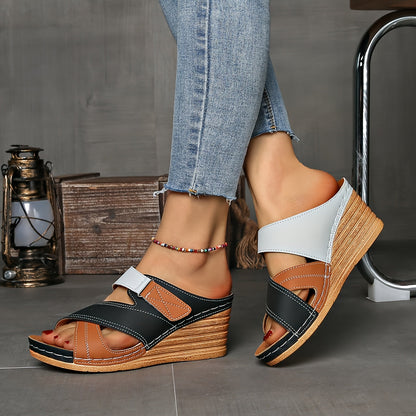 Women's colourblock wedge slides in vibrant hues with cushioned sole and tulip-inspired design