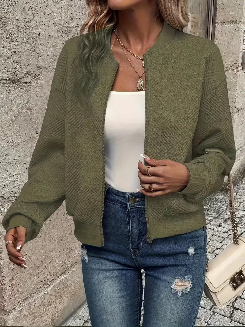 Vibrant blue zip-front women's winter knit cardigan with long sleeves and cozy relaxed fit