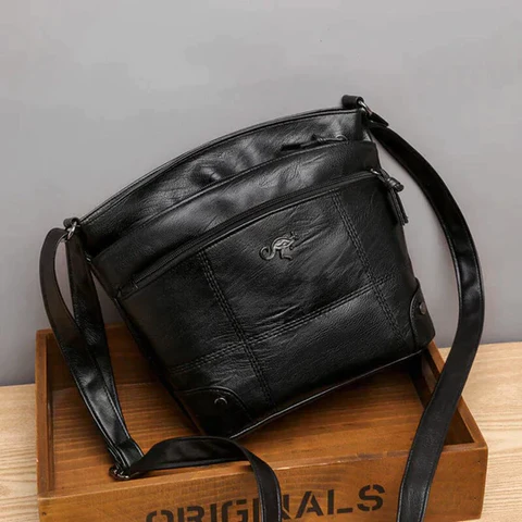 Wavlynn Carolyn black vegan leather crossbody bag structured multi-compartment adjustable strap