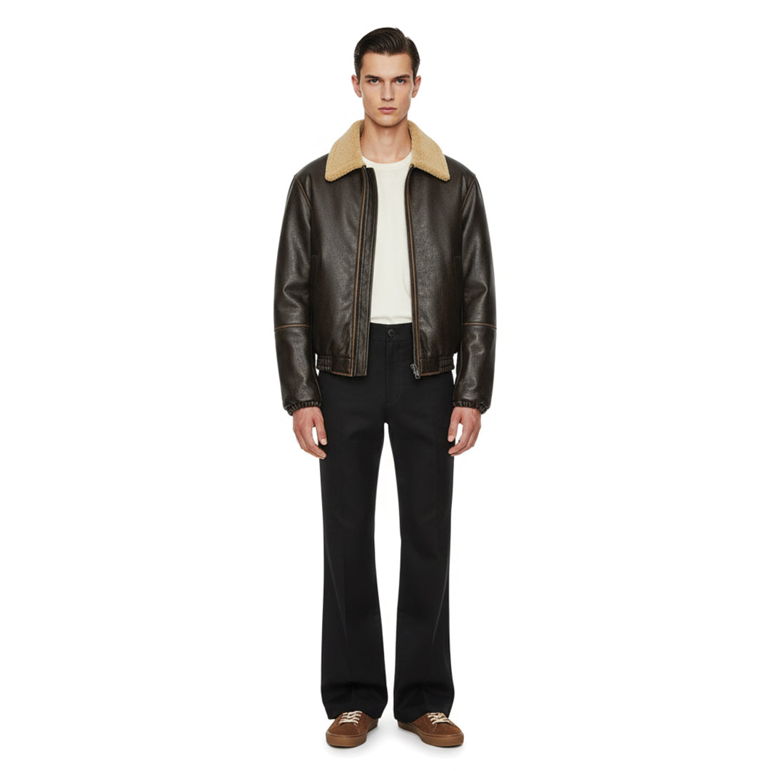 Black vegan leather faux shearling jacket with fade effect chest detail, relaxed fit waist-length silhouette