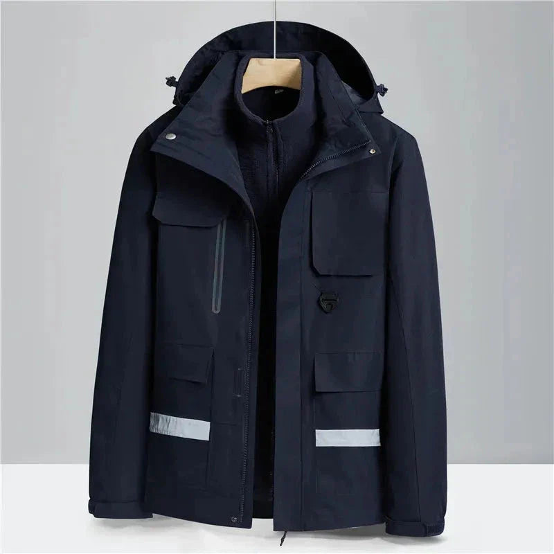 Navy blue 2-in-1 waterproof winter jacket with adjustable hood, windproof shell and insulating inner sweater