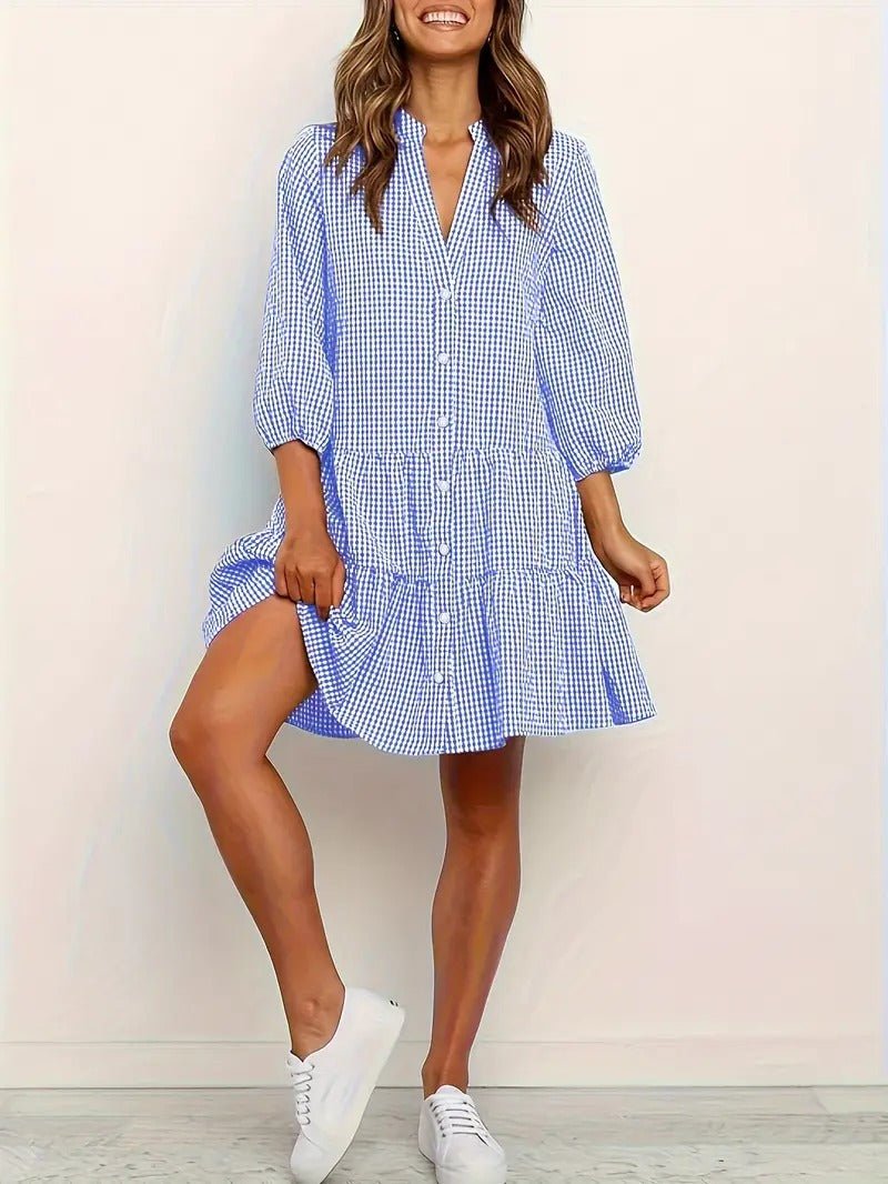 Pink micro-gingham mini dress with tiered button-down front and puffed three-quarter sleeves