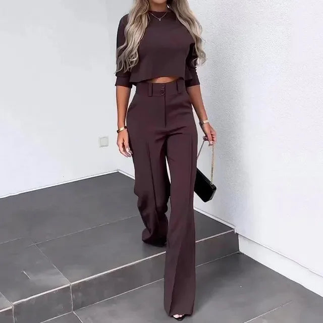 Purple women's two-piece matching set with relaxed silhouette and stretch polyester-blend fabric