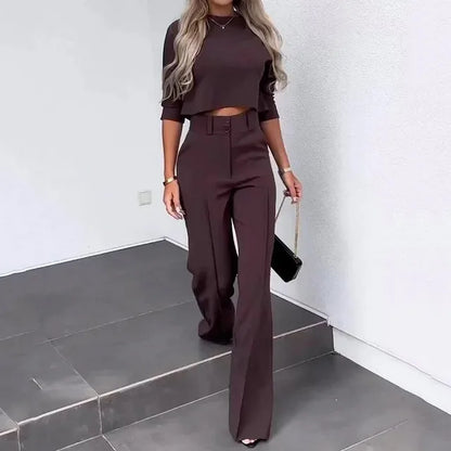 Purple women's two-piece matching set with relaxed silhouette and stretch polyester-blend fabric