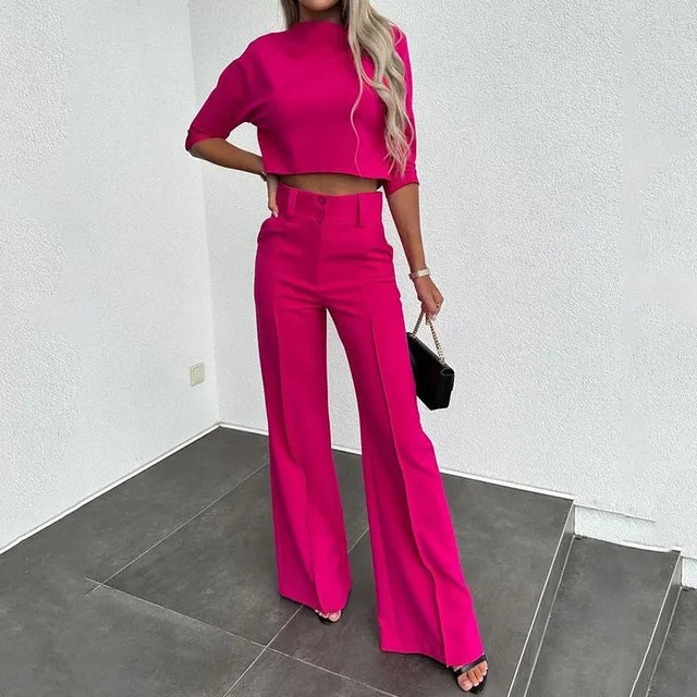 Purple women's two-piece matching set with relaxed silhouette and stretch polyester-blend fabric