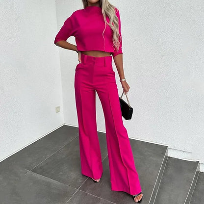 Purple women's two-piece matching set with relaxed silhouette and stretch polyester-blend fabric