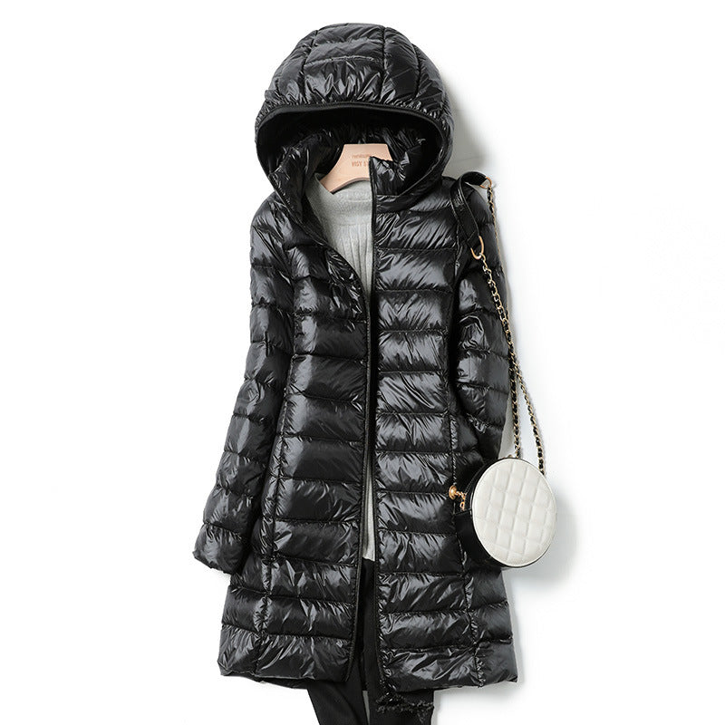 Medium length lightweight thin down jacket in neutral tone, sleek minimalist silhouette with quilted stitching