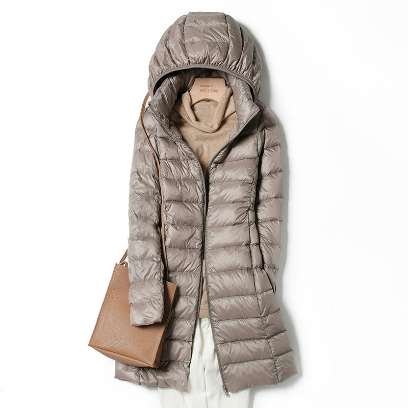 Medium length lightweight thin down jacket in neutral tone, sleek minimalist silhouette with clean lines