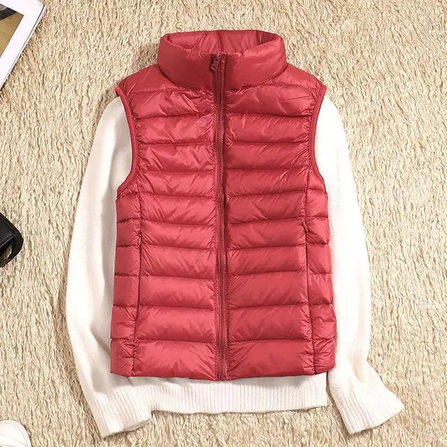 Women's lightweight quilted down vest high collar zipper closure insulated layer for everyday warmth