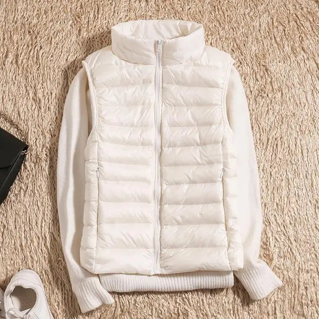 Women's quilted down vest lightweight insulated high collar zipper closure everyday warmth