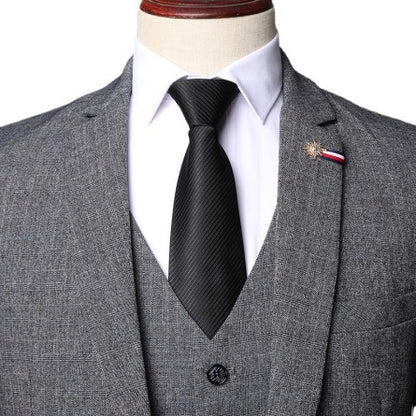 Grey herringbone tweed three-piece suit straight fit Peaky Blinders Thomas Shelby style
