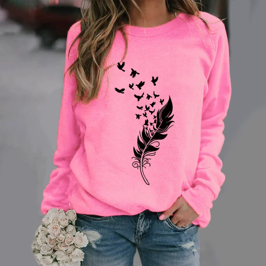 Women's relaxed fit crew neck cotton blend sweatshirt with bold graphic front print in cozy style
