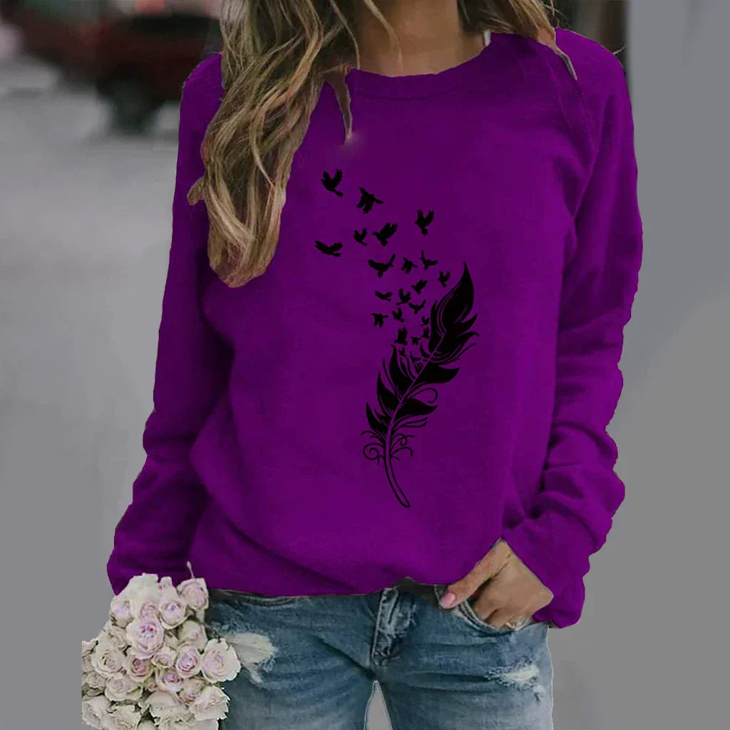 Women's relaxed fit crew neck cotton blend sweatshirt with bold graphic front print in cozy style
