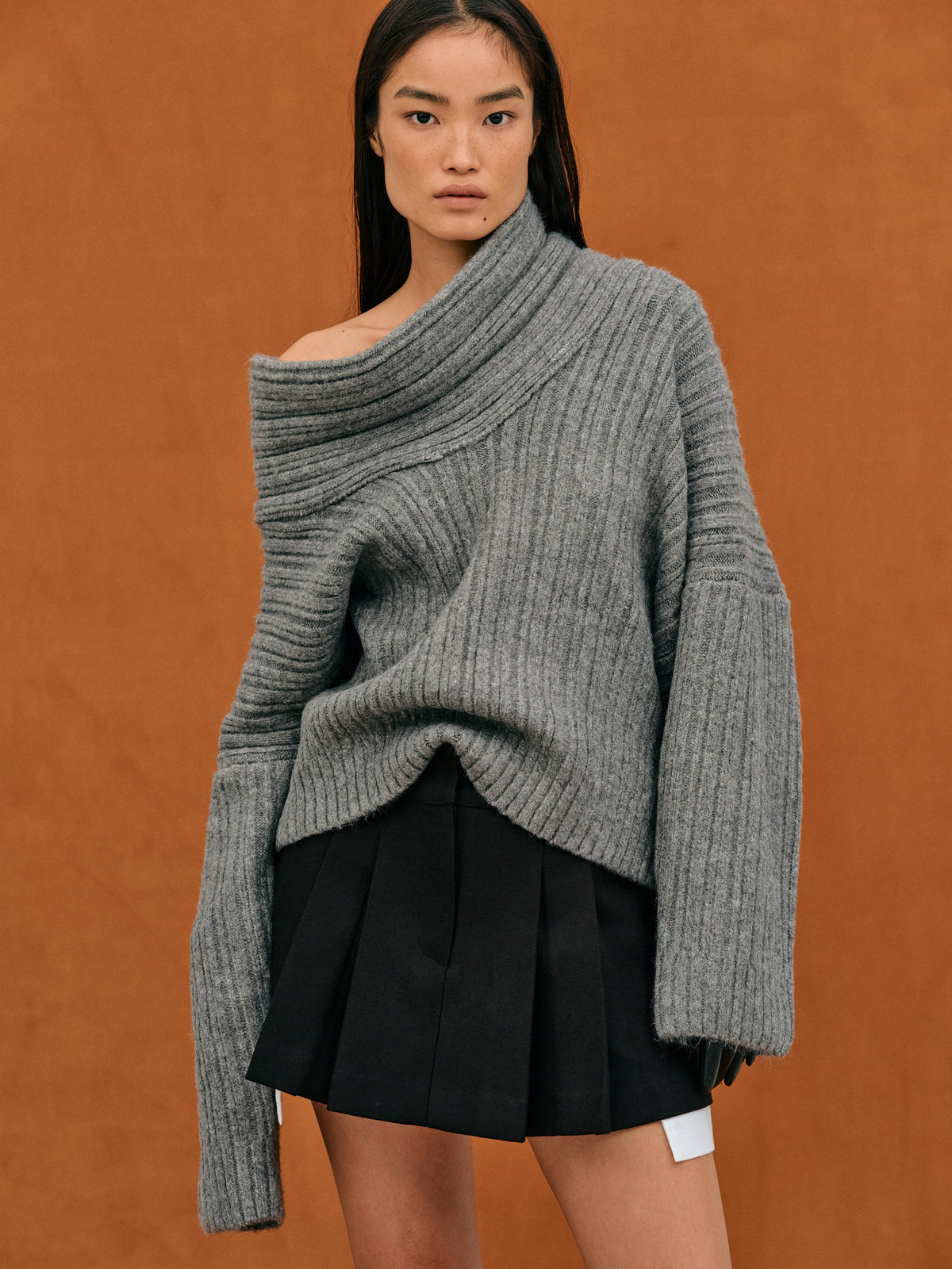 Women's oversized off-shoulder ribbed knit sweater in neutral tone, cozy chic everyday style