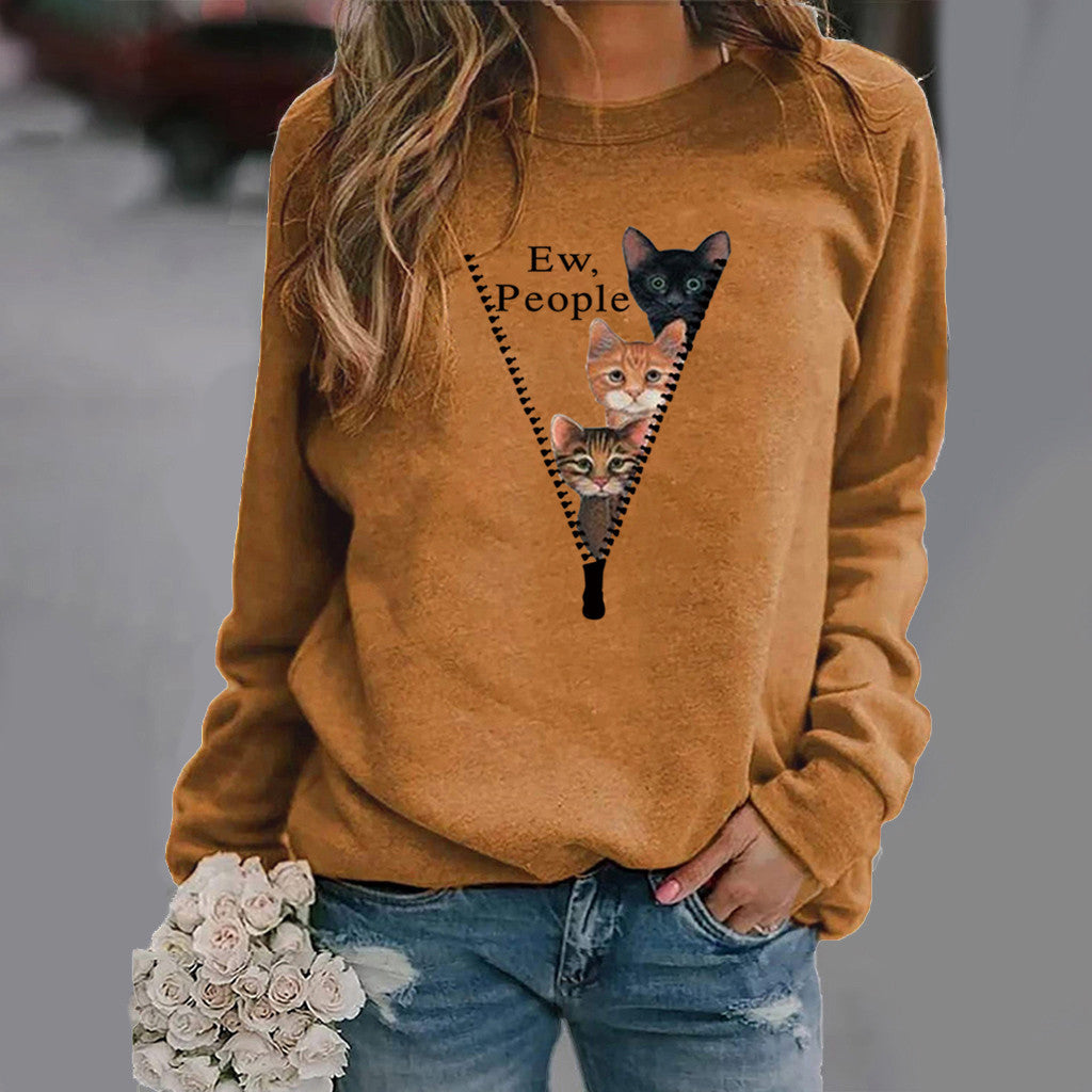 Women's relaxed fit crew neck sweatshirt in soft cotton blend featuring playful cat graphic print