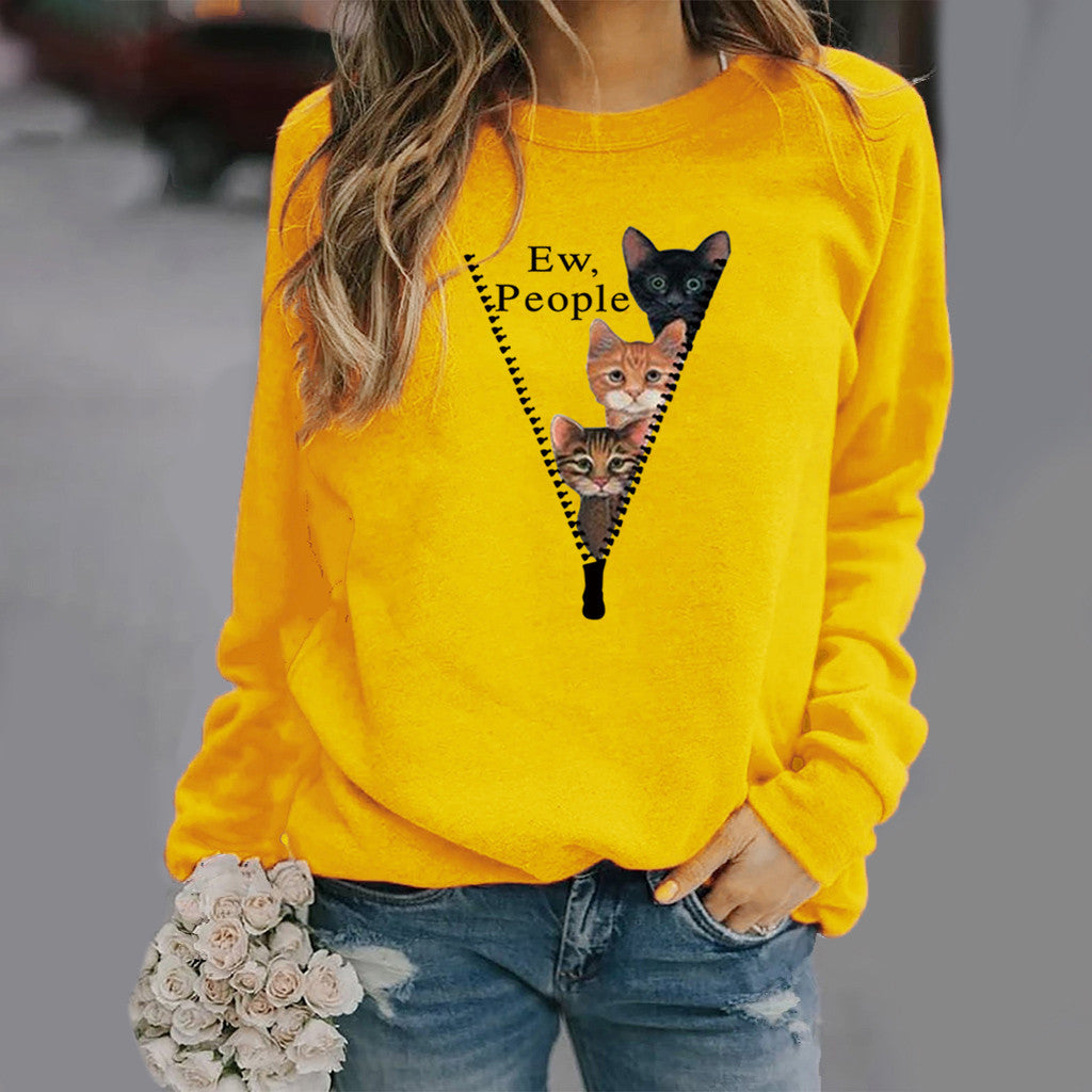 Women's relaxed fit crew neck sweatshirt in soft cotton blend featuring playful cat graphic print