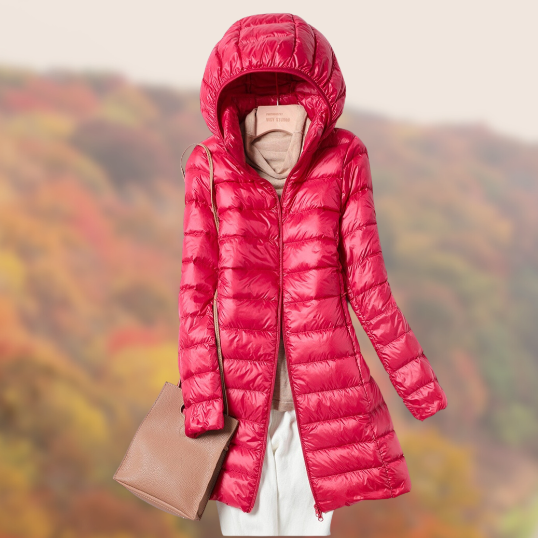 Women's slim fit hooded puffer jacket in sleek design with lightweight warmth and flattering silhouette
