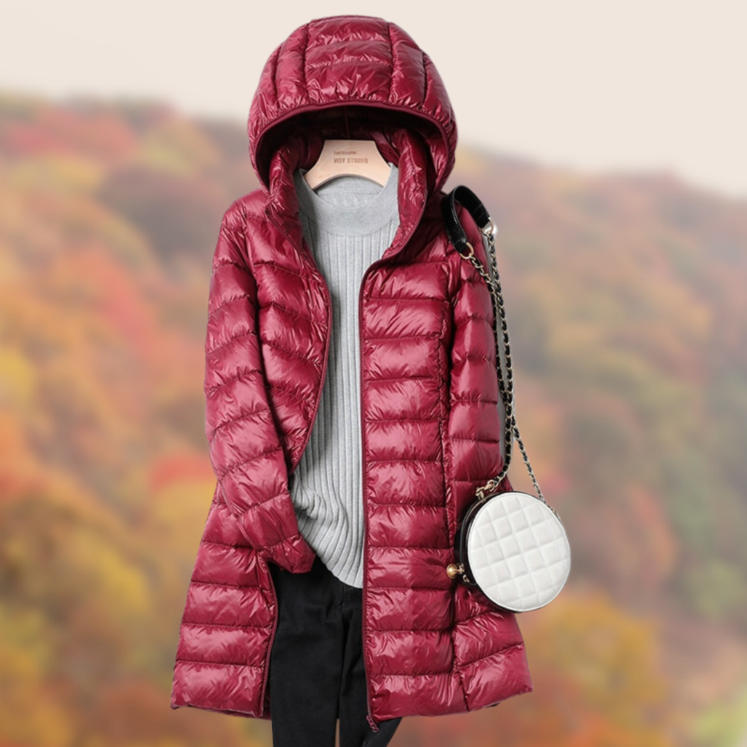 Women's slim fit hooded puffer jacket in sleek lightweight design with flattering streamlined silhouette
